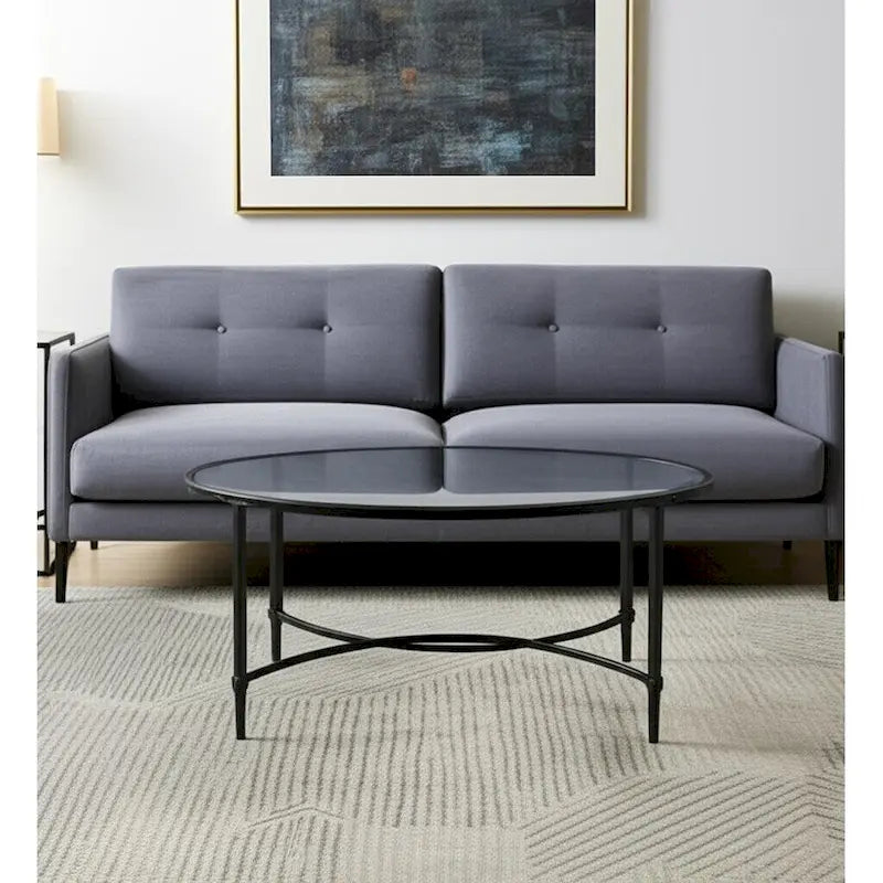 HomeRoots 45 Clear and Black Glass and Metal Oval Coffee Table - 19 H x 45 W x 25 D